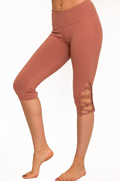 hi-rise Capri with a side crisscross strap cutout
