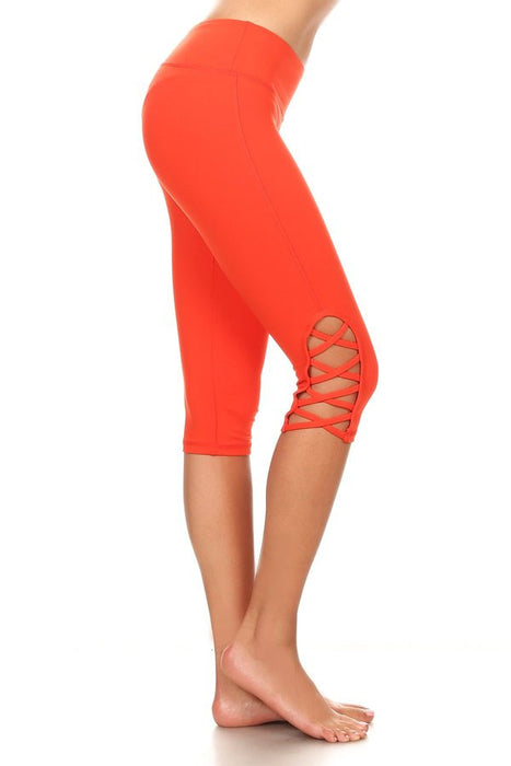 Print hi-rise Capri with a side crisscross strap cutout