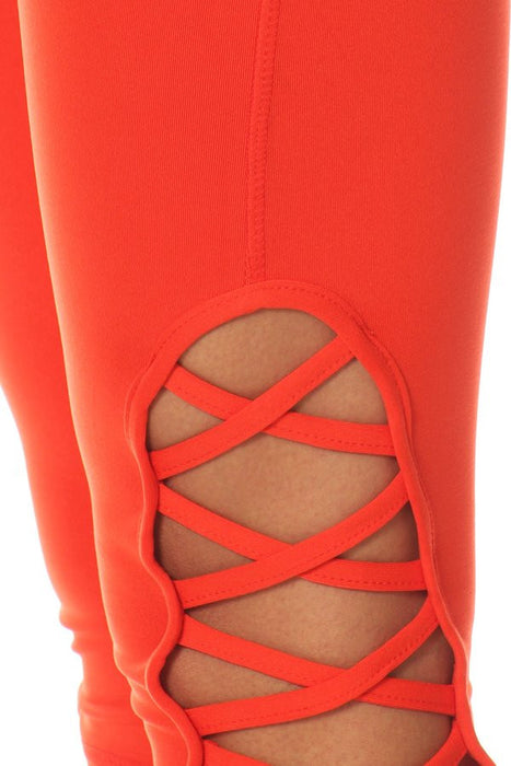 Print hi-rise Capri with a side crisscross strap cutout